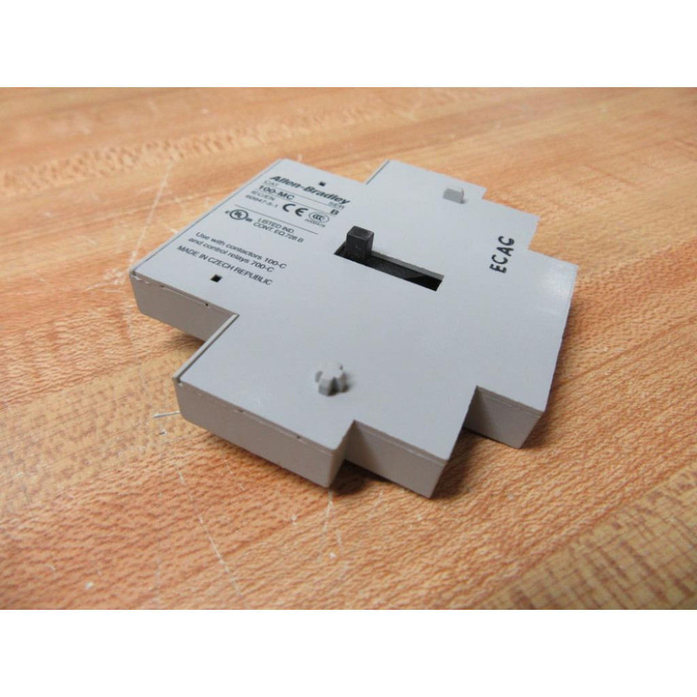 Allen Bradley 100-MCA00 Mech. Interlock 100MCA00 - New No Box Allen Bradley 100-MCA00 Mech. Interlock 100MCA00 - New No Box